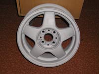 Sublayer coating for polymeric drawing on wheel disk of car